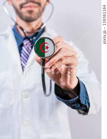 Algeria health and medical insurance concept. Algeria healthcare system, doctor holding stethoscope 139361164