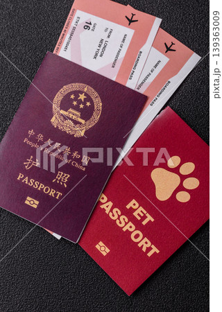 China, Chinese passport with money and flight tickets. Chinese passport China, Chinese passport with money and flight tickets. Chinese passport 139363009