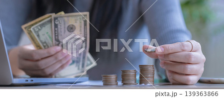 woman working from home concept saving money for finance accounting. woman working from home concept saving money for finance accounting. 139363866
