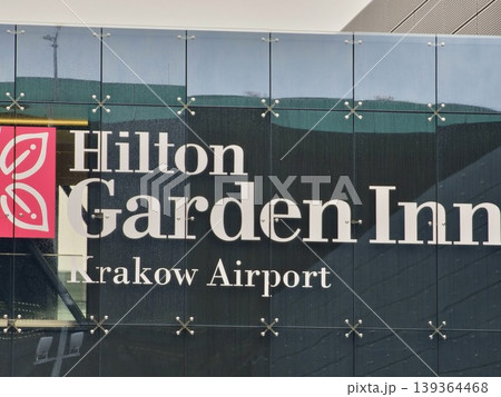Balice, Krakow, Poland - March 27, 2026: Sign on the Hilton Garden Inn Hotel at Krakow Airport. Close up Balice, Krakow, Poland - March 27, 2026: Sign on the Hilton Garden Inn Hotel at Krakow Airport. Close up 139364468