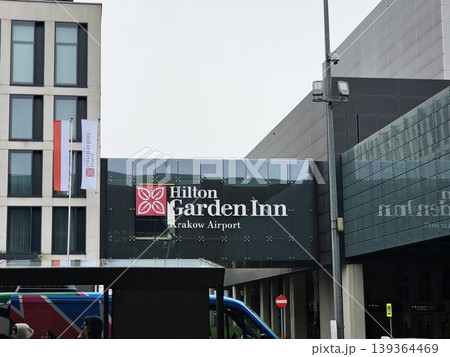 Balice, Krakow, Poland - March 27, 2026: Entrance to the Hilton Garden Inn Krakow Airport. Balice, Krakow, Poland - March 27, 2026: Entrance to the Hilton Garden Inn Krakow Airport. 139364469