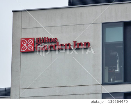 Balice, Krakow, Poland - March 27, 2026: Sign on the Hilton Garden Inn Hotel at Krakow Airport. Balice, Krakow, Poland - March 27, 2026: Sign on the Hilton Garden Inn Hotel at Krakow Airport. 139364470