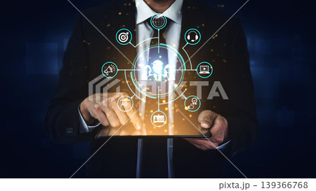 Businessman in Suit Interacting with Digital Interface on Tablet Showcasing Technology and Innovation Concepts for Modern Enterprise Solutions Fluxor Businessman in Suit Interacting with Digital Interface on Tablet Showcasing Technology and Innovation Concepts for Modern Enterprise Solutions Fluxor 139366768