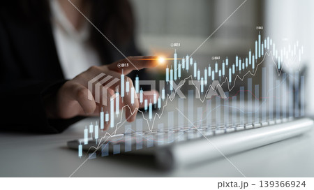 Business Professional Analyzing Data Trends on Laptop with Overlay Graph Representing Financial Growth and Analysis in Modern Office Environment Scalp Business Professional Analyzing Data Trends on Laptop with Overlay Graph Representing Financial Growth and Analysis in Modern Office Environment Scalp 139366924