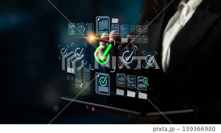 Smart business professional uses a digital tablet to ensure document compliance while showcasing innovative technology and efficient workflow in a modern office setting. Sigmoid Smart business professional uses a digital tablet to ensure document compliance while showcasing innovative technology and efficient workflow in a modern office setting. Sigmoid 139366980