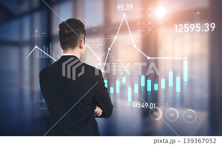 Businessman Analyzing Stock Market Data with Graphs and Charts on Digital Interface during Daylight in Modern Office Setting Scalp Businessman Analyzing Stock Market Data with Graphs and Charts on Digital Interface during Daylight in Modern Office Setting Scalp 139367052