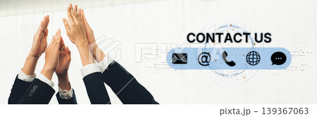 Hands of diverse professionals reaching up together in collaboration symbolizing teamwork, success, and communication for modern business dynamics Trope 139367063