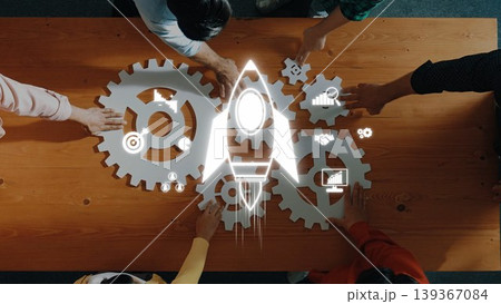 Collaborative Teamwork in Innovation with Gears and Rocket Icon on Wooden Table for Business, Strategy, and Development Concepts. Raster Collaborative Teamwork in Innovation with Gears and Rocket Icon on Wooden Table for Business, Strategy, and Development Concepts. Raster 139367084