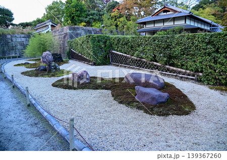 The Japanese gardern view of nijo jo castle, Kyoto, Japan. World Heritage Site, Japanese old traditional architecture in Kyoto, Japan. Background landscape of the beauty of Nijo Castle at sunny day. 139367260