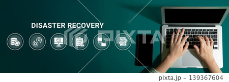 Hands Typing on Laptop during Disaster Recovery Process with Icons Representing Data Backup, Security, and Technology Solutions Ledger 139367604