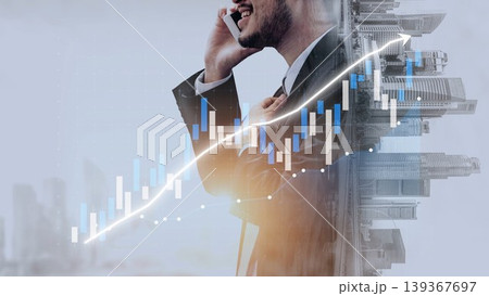 Businessman in Suit Talking on Phone with Graph Overlay Representing Growth and Financial Success in Modern Urban Environment Copula 139367697