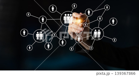 Hands of a Person Creating a Social Network Diagram Illustrating Connections, Relationships, and Community Engagement in a Digital Space Ledger Hands of a Person Creating a Social Network Diagram Illustrating Connections, Relationships, and Community Engagement in a Digital Space Ledger 139367866
