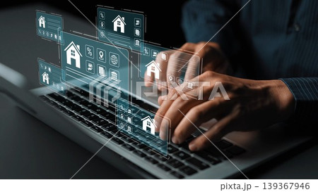 Hands Typing on Laptop with Home Icons and Digital Interface Elements Representing Real Estate and Technology Interaction Gluon Hands Typing on Laptop with Home Icons and Digital Interface Elements Representing Real Estate and Technology Interaction Gluon 139367946