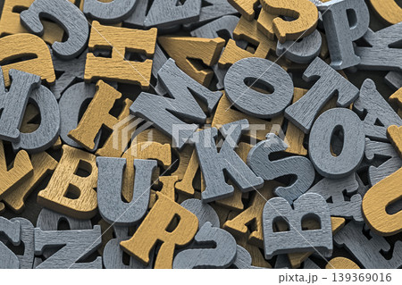 Pile of wooden letters. Typography background composition. Pile of wooden letters. Typography background composition. 139369016