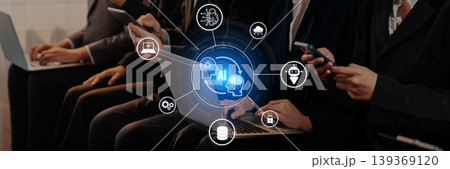 Individuals Engaged with Technology, Using Laptops and Smartphones, Surrounded by AI and Data Icons Representing Digital Innovation and Connectivity Trope Individuals Engaged with Technology, Using Laptops and Smartphones, Surrounded by AI and Data Icons Representing Digital Innovation and Connectivity Trope 139369120