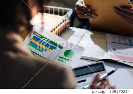 Business woman accountant working in office checking financial accounts and allocating company budgets. Business woman accountant working in office checking financial accounts and allocating company budgets. 139370224