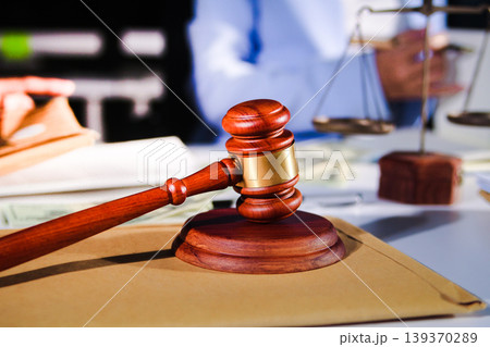 Consultation and conference of professional businesswoman and Male lawyers working and discussion having at law firm in office. Concepts of law, Judge gavel with scales of justice Consultation and conference of professional businesswoman and Male lawyers working and discussion having at law firm in office. Concepts of law, Judge gavel with scales of justice 139370289