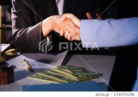 Consultation and conference of professional businesswoman and Male lawyers working and discussion having at law firm in office. Concepts of law, Judge gavel with scales of justice Consultation and conference of professional businesswoman and Male lawyers working and discussion having at law firm in office. Concepts of law, Judge gavel with scales of justice 139370296