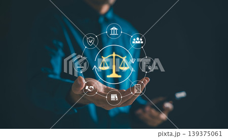 Lawyer provides legal justice, law services, legislation advice, displaying glowing digital scales icons with courtroom symbols representing client protection or rights assistance digitally 139375061