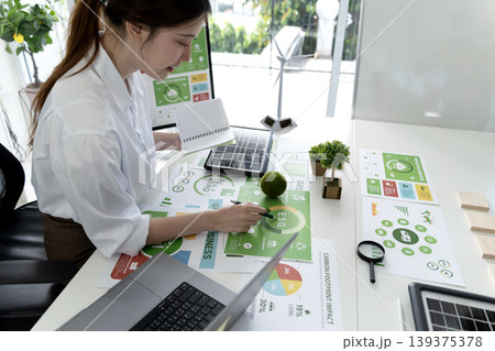Business woman is planning for esg environmental social corporate governance Business woman is planning for esg environmental social corporate governance 139375378