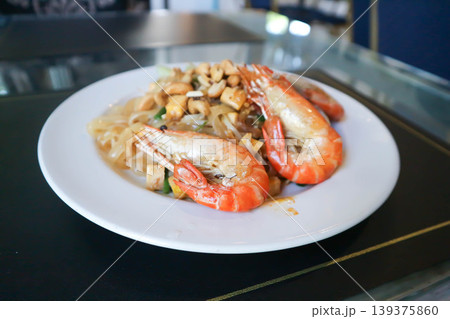 dry prawn noodles or stir fried noodles or pad thai , noodles without soup or Thai food or dry noodles or prawn noodles dry prawn noodles or stir fried noodles or pad thai , noodles without soup or Thai food or dry noodles or prawn noodles 139375860