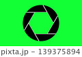 A simple graphic icon showing a black camera shutter aperture symbol set against a vivid green background, perfect for photography, film production, and visual media concepts. A simple graphic icon showing a black camera shutter aperture symbol set against a vivid green background, perfect for photography, film production, and visual media concepts. 139375894