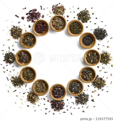 Tea leaves arranged in decorative bowls. Circular wooden bowls filled with various teas Tea leaves arranged in decorative bowls. Circular wooden bowls filled with various teas 139377585