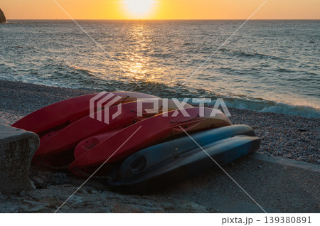 Boats and Beach of Etretat at Sunset 139380891