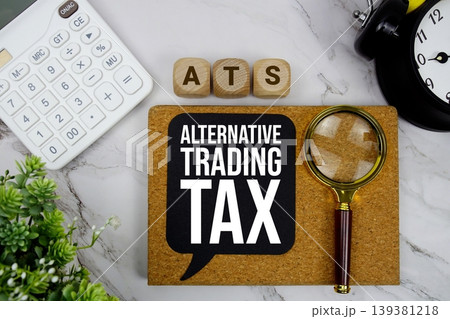 ATS Alternative Trading Tax text with calculator, magnifying glass and alarm clock on marble background 139381218