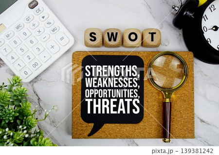 SWOT Strengths, Weaknesses, Opportunities, Threats text with calculator, magnifying glass and alarm clock on marble background SWOT Strengths, Weaknesses, Opportunities, Threats text with calculator, magnifying glass and alarm clock on marble background 139381242