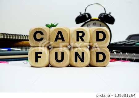 Card Fund alphabet letters with calculator and alarm clock on white background Card Fund alphabet letters with calculator and alarm clock on white background 139381264