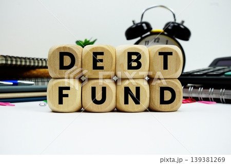 Debt Fund alphabet letters with calculator and alarm clock on white background Debt Fund alphabet letters with calculator and alarm clock on white background 139381269