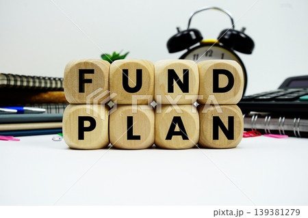 Fund Plan alphabet letters with calculator and alarm clock on white background 139381279