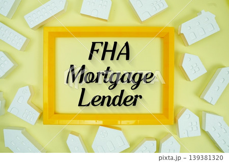 FHA Mortgage Lender text with house models on yellow background 139381320