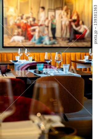 Sophisticated social environment with artistic backgrounds and cozy furniture arrangements 139381363