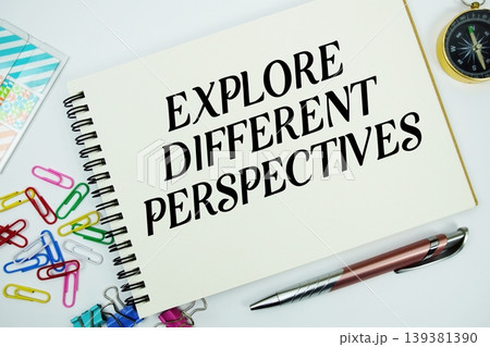 Explore Different Perspectives text message written on notepad with stationery flat lay on white background 139381390