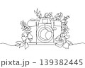 Beautiful single line drawing of a camera with blooming flowers around it as frame. This lovely photography concept is wonderfully suited for Nature Photography Day posters and art exhibitions. 139382445