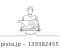 Continuous line drawing of a handsome young man presenting a huge roasted turkey on big tray. This simple food concept is extremely ideal for National Turkey Lovers Day cooking guides and recipe ads. 139382455