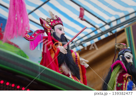 Traditional Taiwanese Glove Puppet Holding Sword Outdoor at Temple Festival Traditional Taiwanese Glove Puppet Holding Sword Outdoor at Temple Festival 139382477