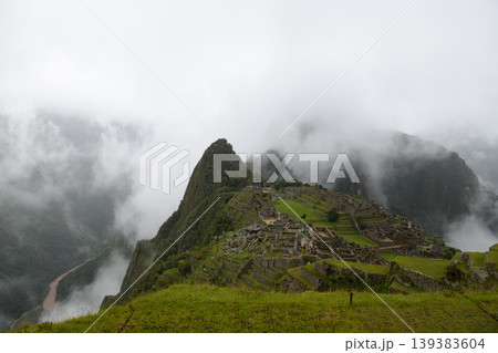 Mysterious fog over machu picchu ancient inca ruin creates majestic peaceful mood Mysterious fog over machu picchu ancient inca ruin creates majestic peaceful mood 139383604