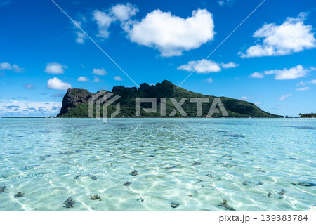 View of Maupiti Island from a white sand beach, French Polynesia View of Maupiti Island from a white sand beach, French Polynesia 139383784