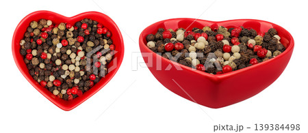 Pepper mix in a ceramic bowl isolated on white background. Top view Pepper mix in a ceramic bowl isolated on white background. Top view 139384498