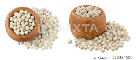 White peppercorns or pepper in wooden bowl isolated on white background. Top view. Flat lay 139384500