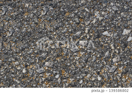 Rough asphalt road surface texture background Rough asphalt road surface texture background 139386802