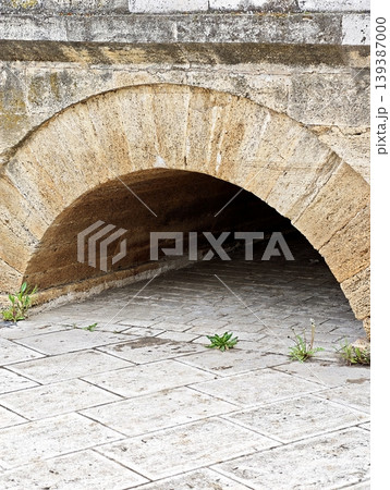 a stone arch on a historical Ottoman bridge in Edirne, Turkey. a stone arch on a historical Ottoman bridge in Edirne, Turkey. 139387000