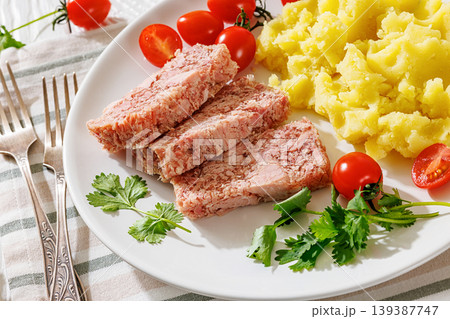 Slices of classic head cheese with mashed potatoes Slices of classic head cheese with mashed potatoes 139387747