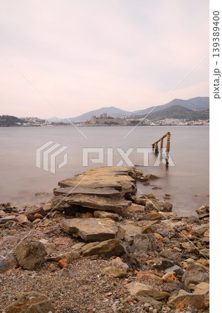 Abandoned pier and Panoramic view of Bodrum city, Turkey and Saint Peter Castle and marina. Summer landscape, popular travel destination. Selective Focus. Long Exposure shoot. tranquility scene. 139389400