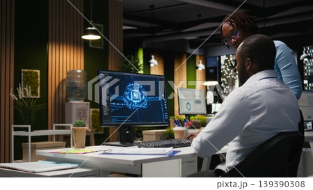 Black colleagues team using AI analytics platform for monthly data reports, reviewing neural networks algorithms and automation for business productivity. IT company representative at work. Black colleagues team using AI analytics platform for monthly data reports, reviewing neural networks algorithms and automation for business productivity. IT company representative at work. 139390308