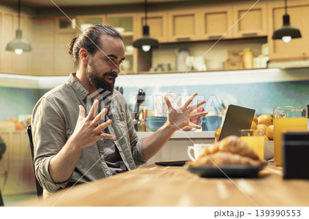 Work accomplishment, authentic positive emotion, satisfied man with victory, getting a promotion and telecommuting. Unexpected news, excitement and gratitude, ambitious worker. 139390553