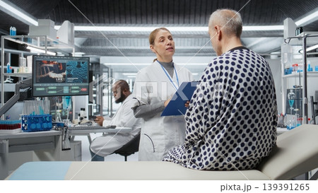 Healthcare professionals examine a patient vitals during drug testing, collecting data on chemical reactions and outcomes to advance medicine. Effective pharmaceutical development. Camera A. 139391265